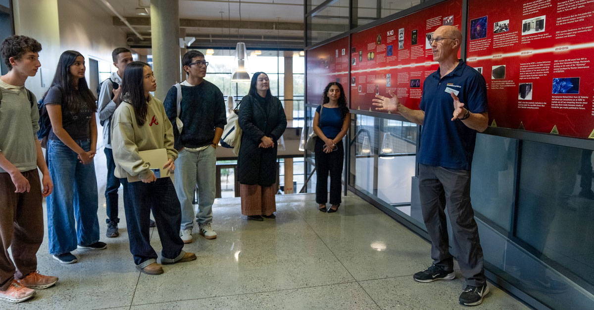 A group of high school students on a tour of SDSC. 