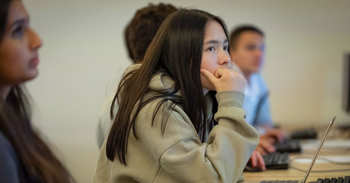 Students focus on their assignment for the lab part of the afternoon